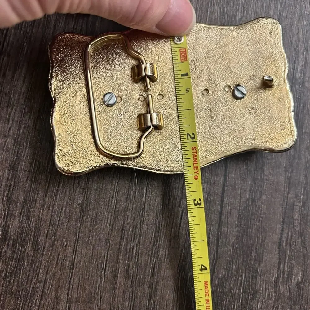 Gold USA E Pluribus Eagle One Dollar men’s belt buckle.